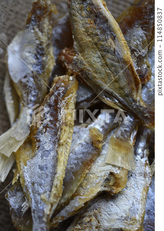 Dried fish for beer. Slices of chopped fish as an appetizer. 114850837