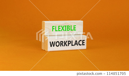 Flexible workplace symbol. Concept words Flexible workplace on beautiful wooden block. Beautiful orange paper background. Business Flexible workplace concept. Copy space. 114851705