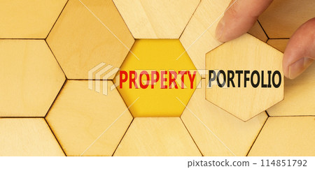 Property portfolio symbol. Concept words Property portfolio on beautiful wooden puzzles. Beautiful yellow background. Businessman hand. Business Property portfolio concept. Copy space. Property portfolio symbol. Concept words Property portfolio on beautiful wooden puzzles. Beautiful yellow background. Businessman hand. Business Property portfolio concept. Copy space. 114851792