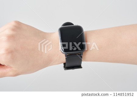 Smartwatch on a woman's wrist Smartwatch on a woman's wrist 114851952