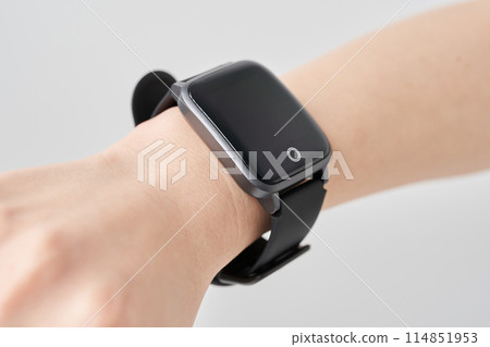 Smartwatch on a woman's wrist Smartwatch on a woman's wrist 114851953