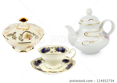 Vintage candy bowl, tea cup and teapot isolated on white. Collage. Vintage candy bowl, tea cup and teapot isolated on white. Collage. 114852734