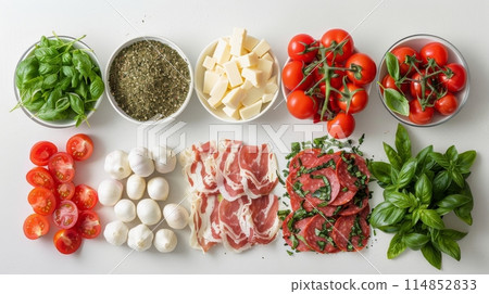 Assorted Ingredients Arranged on White Surface 114852833