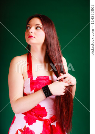 Long haired woman in summer dress. Long haired woman in summer dress. 114853002