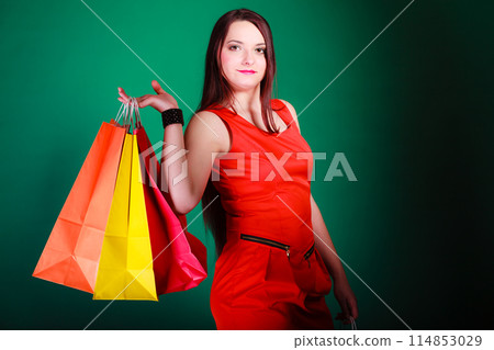 Woman with shopping bags. 114853029
