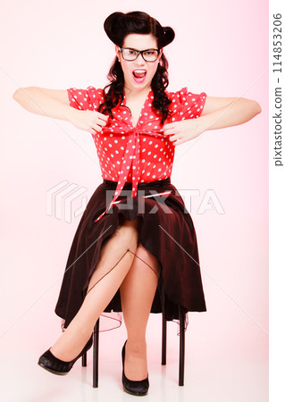 Retro. Angry pinup girl in eyeglasses screaming Retro. Angry pinup girl in eyeglasses screaming 114853206