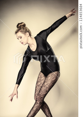 Graceful woman ballet dancer 114853684