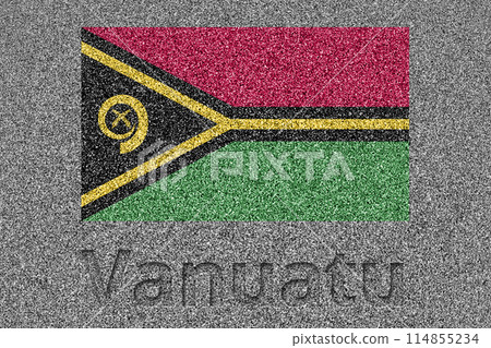 The Vanuatu flag painted on a stone slab with the word "Vanuatu" carved into it 114855234