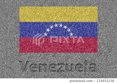 The Venezuelan flag painted on a stone slab with the word "Venezuela" carved into it 114855236