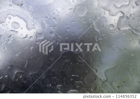 Detail of wet steel surface with rain drops 114856352