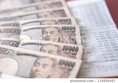 Passbook and money Passbook and money 114856487
