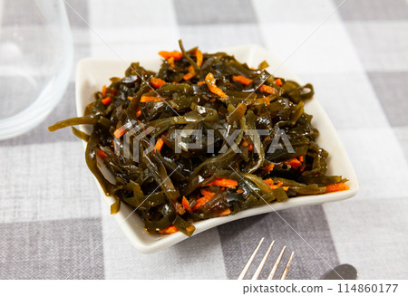 Sea kale salad with carrots served in bowl Sea kale salad with carrots served in bowl 114860177