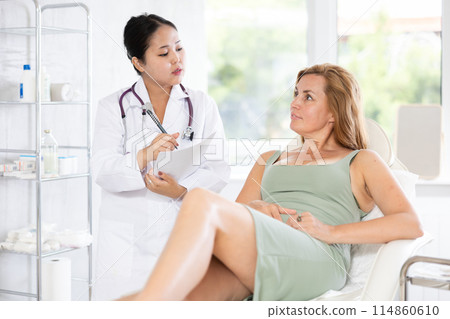 European woman signing a facial procedure contract European woman signing a facial procedure contract 114860610