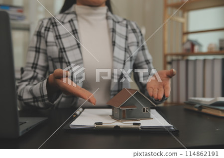 buy or sell real estate mortgage, Sale representative offer house purchase contract to buy a house or apartment and mortgage Money and Financial Concepts buy or sell real estate mortgage, Sale representative offer house purchase contract to buy a house or apartment and mortgage Money and Financial Concepts 114862191