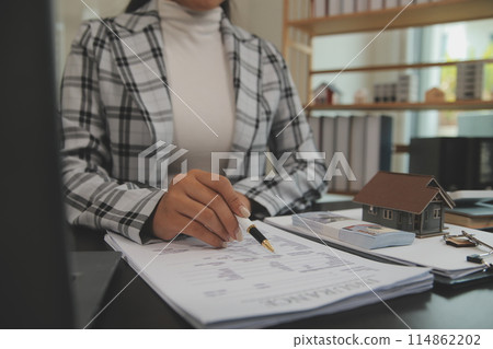 buy or sell real estate mortgage, Sale representative offer house purchase contract to buy a house or apartment and mortgage Money and Financial Concepts buy or sell real estate mortgage, Sale representative offer house purchase contract to buy a house or apartment and mortgage Money and Financial Concepts 114862202
