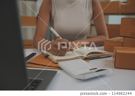 Portrait of young business asian woman online working in office desk use computer copyspace. Success business people employee, freelance SME online marketing work at home, coworking space concept Portrait of young business asian woman online working in office desk use computer copyspace. Success business people employee, freelance SME online marketing work at home, coworking space concept 114862244