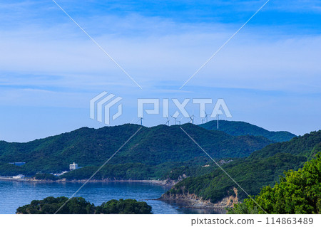 The Naruto Strait as seen from the temporary store at Roadside Station Usushio. Wind turbines built on a protruding peninsula. 114863489