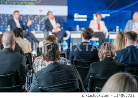 Audience listening to speakers at business conference seminar 114863721