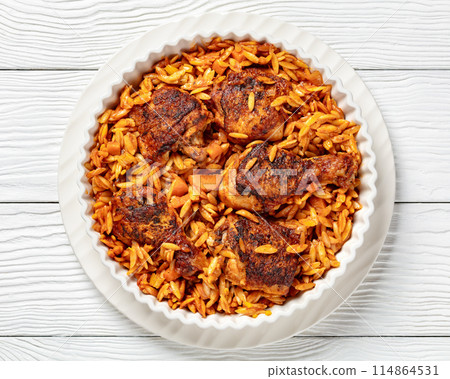 baked greek chicken orzo stew in tomato sauce baked greek chicken orzo stew in tomato sauce 114864531