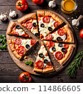 Delicious pizza topped with cheese, tomato on wooden table. 114866605