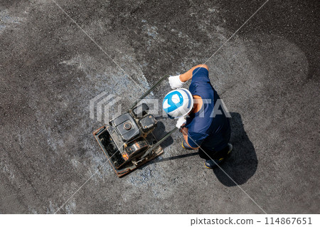 Asphalt construction work Asphalt construction work 114867651