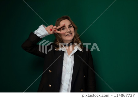 Woman in Black Jacket and White Shirt 114867727