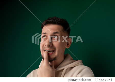 Man Making Funny Face With Finger Man Making Funny Face With Finger 114867961