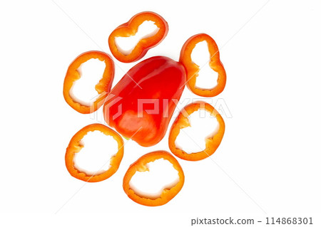 Red sweet ripe pepper cut into circles,slices on white Red sweet ripe pepper cut into circles,slices on white 114868301