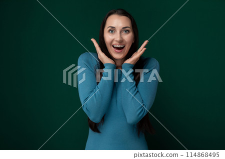 Woman Making Funny Face With Her Hands 114868495
