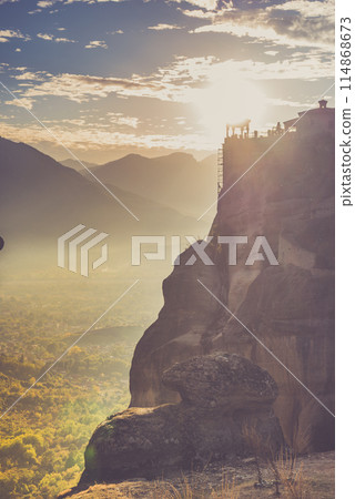 Sunset over Varlaam monastery in Meteora, Greece 114868673