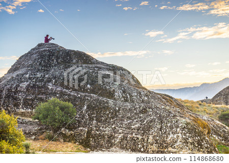 Tourist taking photo in mountains Meteora Greece 114868680