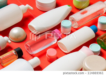 Group of plastic bodycare bottle Flat lay composition with cosmetic products on colored background empty space for you design. Set of White Cosmetic containers, top view with copy space Group of plastic bodycare bottle Flat lay composition with cosmetic products on colored background empty space for you design. Set of White Cosmetic containers, top view with copy space 114869361