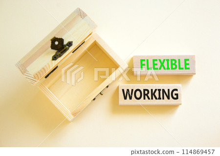 Flexible working symbol. Concept words Flexible working on beautiful wooden block. Beautiful white paper background. Empty wooden chest. Business flexible working concept. Copy space. Flexible working symbol. Concept words Flexible working on beautiful wooden block. Beautiful white paper background. Empty wooden chest. Business flexible working concept. Copy space. 114869457