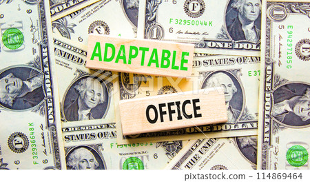 Adaptable office symbol. Concept words Adaptable office on beautiful wooden block. Beautiful dollar bills background. Dollar bills. Business Adaptable office concept. Copy space. Adaptable office symbol. Concept words Adaptable office on beautiful wooden block. Beautiful dollar bills background. Dollar bills. Business Adaptable office concept. Copy space. 114869464