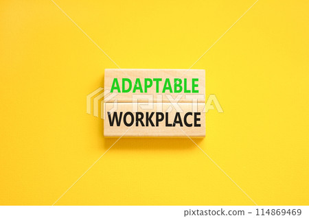 Adaptable workplace symbol. Concept words Adaptable workplace on beautiful wooden block. Beautiful yellow paper background. Business Adaptable workplace concept. Copy space. Adaptable workplace symbol. Concept words Adaptable workplace on beautiful wooden block. Beautiful yellow paper background. Business Adaptable workplace concept. Copy space. 114869469
