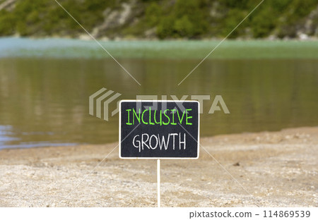 Inclusive growth symbol. Concept words Inclusive growth on beautiful black chalk blackboard. Beautiful sand beach mountain lake background. Business inclusive growth concept. Copy space. Inclusive growth symbol. Concept words Inclusive growth on beautiful black chalk blackboard. Beautiful sand beach mountain lake background. Business inclusive growth concept. Copy space. 114869539