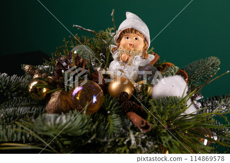 Close Up of a Christmas Ornament on a Tree 114869578