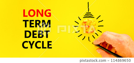 Long term debt cycle symbol. Concept words Long term debt cycle on beautiful yellow paper. Beautiful yellow background. Businessman hand. Business Long term debt cycle concept. Copy space. 114869650