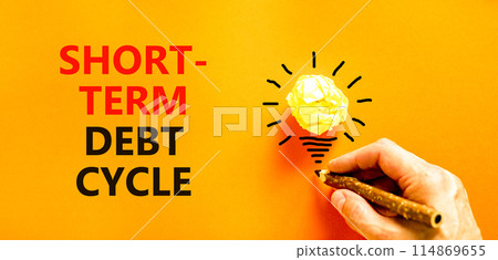Short-term debt cycle symbol. Concept words Short-term debt cycle on beautiful orange paper. Beautiful orange background. Businessman hand. Business Short-term debt cycle concept. Copy space 114869655