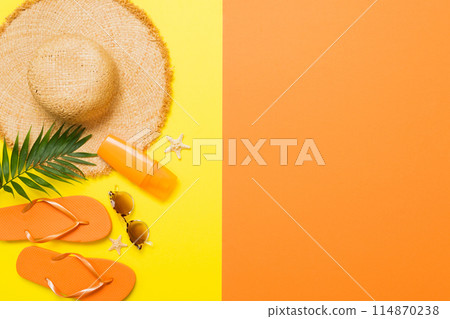 Top view travel or vacation concept. Composition with stylish beach accessories on colored background, top view. Beach fashion flat lay, summer concept. Trendy colors Top view travel or vacation concept. Composition with stylish beach accessories on colored background, top view. Beach fashion flat lay, summer concept. Trendy colors 114870238