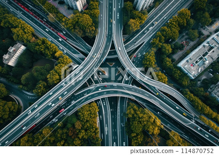 Shot of aerial capture of a highway interchange with a central railway line. Generative AI 114870752