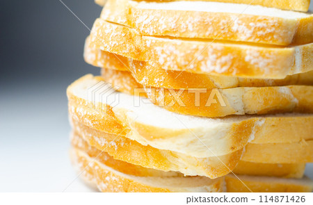 White toast cut into slices, freshly baked for breakfast, soft bread 114871426