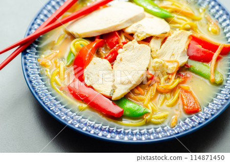 Chicken broth with ginger and black fungus mushrooms, high protein wheat noodles, sliced steamed chicken breast, julienne carrot 114871450