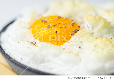 A cloud egg with a sprinkle of pepper on top A cloud egg with a sprinkle of pepper on top 114871493