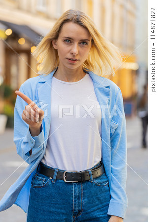 Displeased upset woman reacting unpleasant awful idea dissatisfied with bad quality shake finger No 114871822