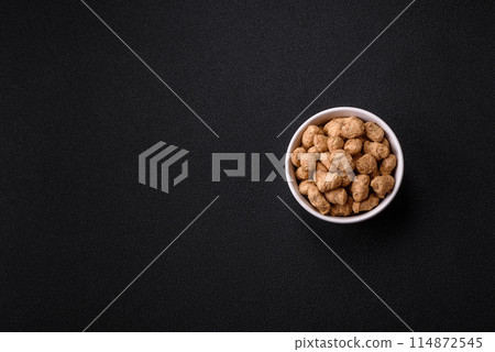 Dry soybean meat pellets, diet food for vegan and vegetarian cuisine Dry soybean meat pellets, diet food for vegan and vegetarian cuisine 114872545