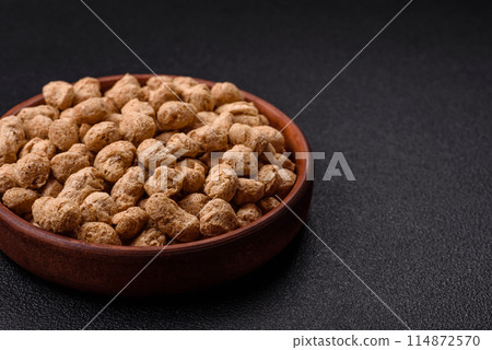 Dry soybean meat pellets, diet food for vegan and vegetarian cuisine Dry soybean meat pellets, diet food for vegan and vegetarian cuisine 114872570