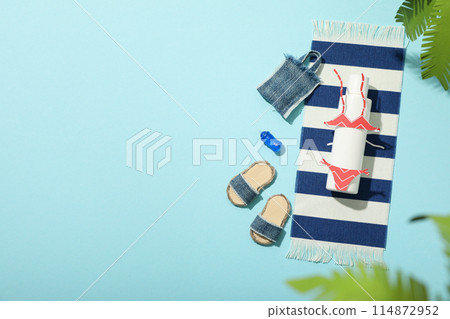 Swimsuit and other accessories for a summer trip to the sea. 114872952