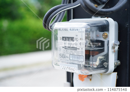 Electric measuring power meter for energy cost at home and office. 114875548