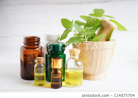 Alternative medicine herbal organic capsule with vitamin E omega 3 fish oil, mineral, drug with herbs leaf natural supplements for healthy good life. 114875704